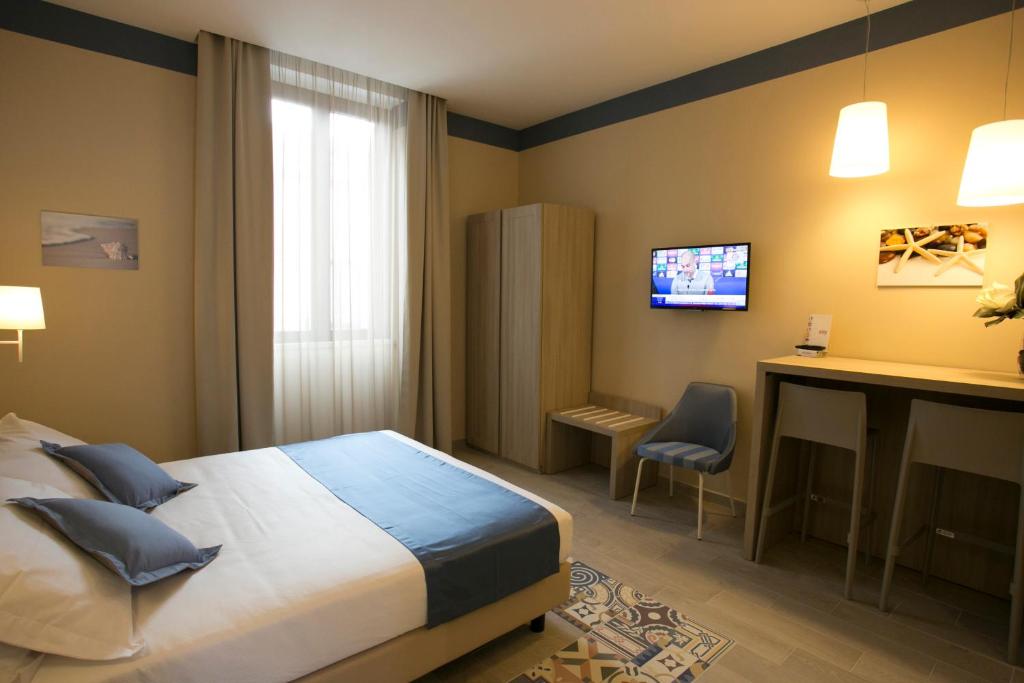 A bed or beds in a room at Map holiday residence