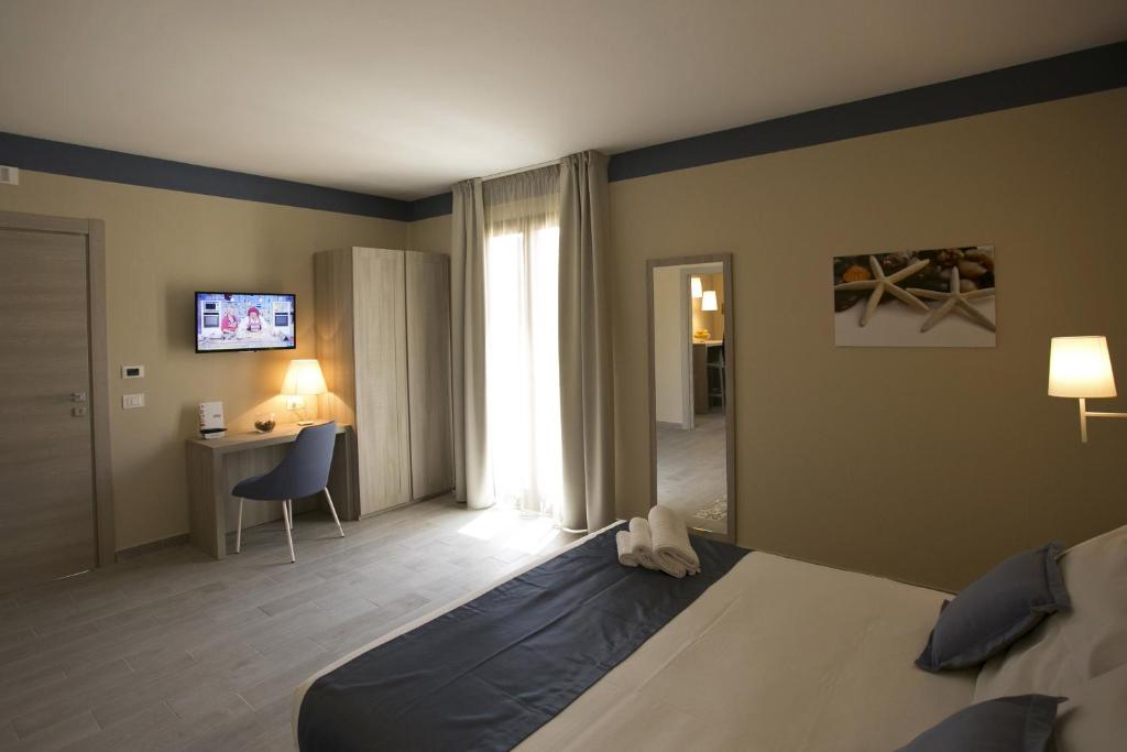 A bed or beds in a room at Map holiday residence