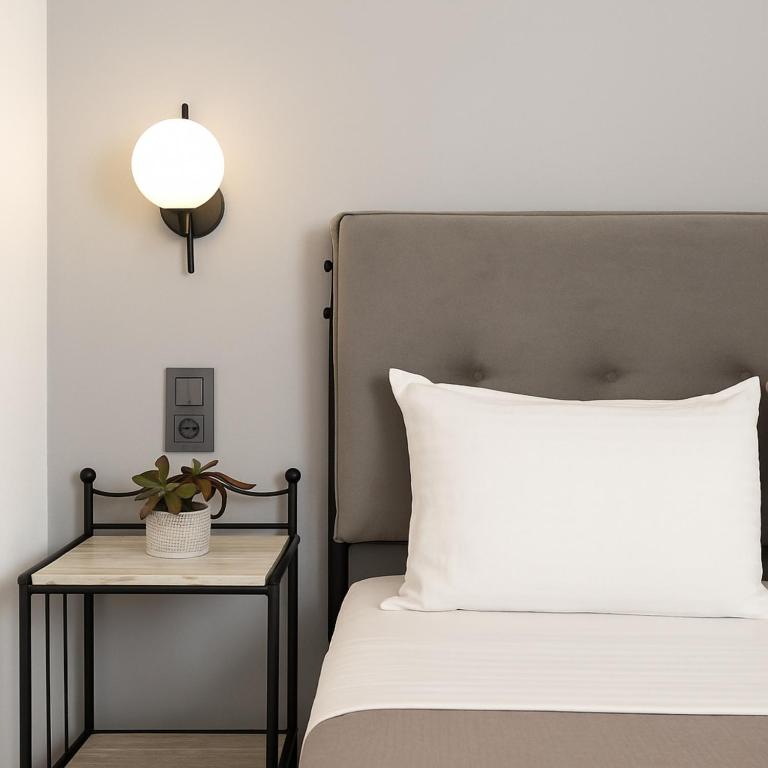 Postel nebo postele na pokoji v ubytování Fissas Rooms