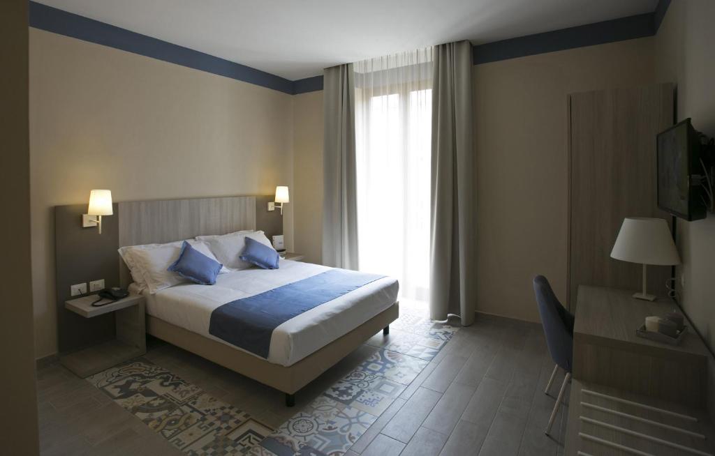 A bed or beds in a room at Map holiday residence