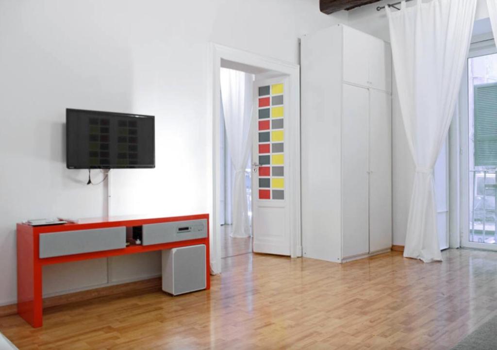 A television and/or entertainment centre at Appartamento Casa Toledo