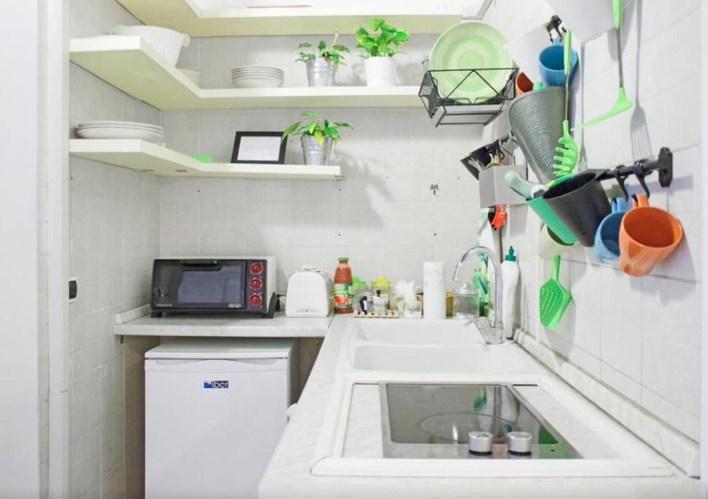 A kitchen or kitchenette at Appartamento Casa Toledo