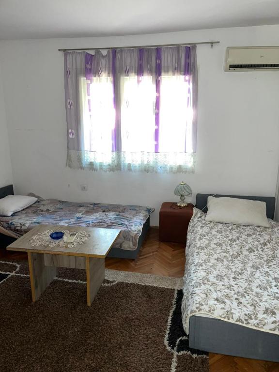 Postel nebo postele na pokoji v ubytování Rudnička kapija RK