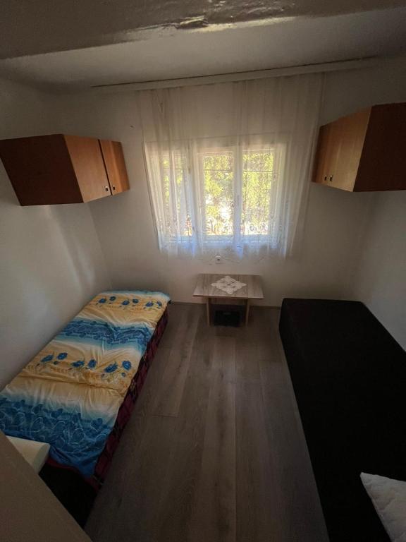 Postel nebo postele na pokoji v ubytování Rudnička kapija RK