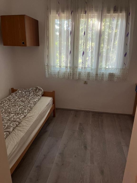 Postel nebo postele na pokoji v ubytování Rudnička kapija RK