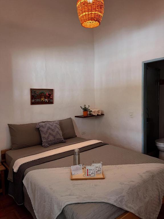 Postel nebo postele na pokoji v ubytování Casa Quintanilla Barichara