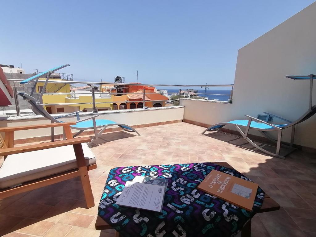 Balkón nebo terasa v ubytování Cap Ouest Praia
