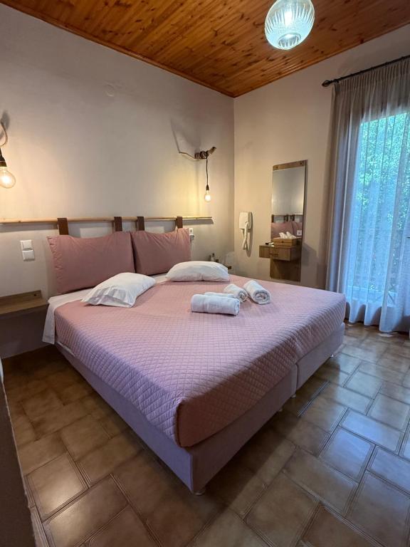 Postel nebo postele na pokoji v ubytování Corali rooms pelion
