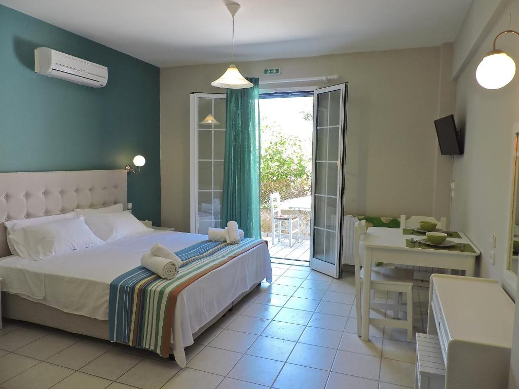Postel nebo postele na pokoji v ubytování Villa Theodora