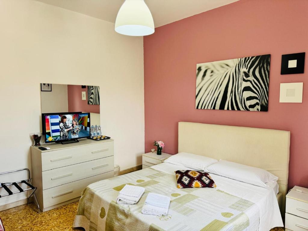 Postel nebo postele na pokoji v ubytování Prime Guest House