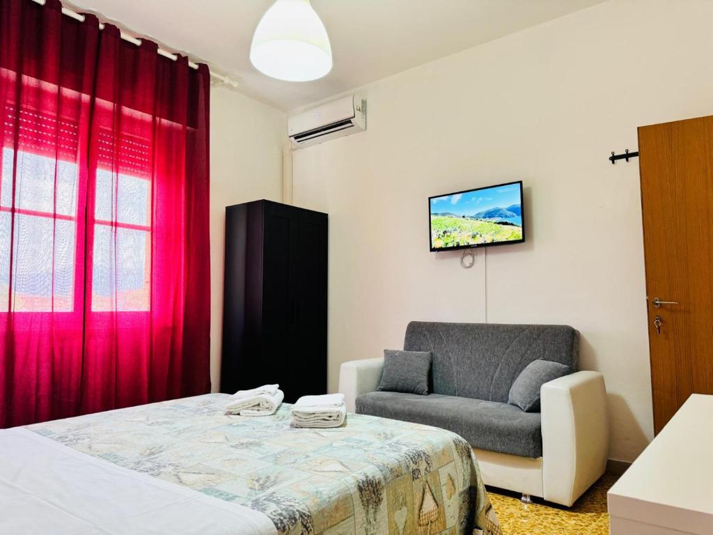 Postel nebo postele na pokoji v ubytování Prime Guest House