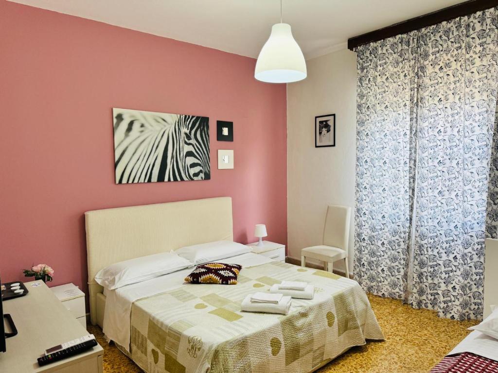 Postel nebo postele na pokoji v ubytování Prime Guest House