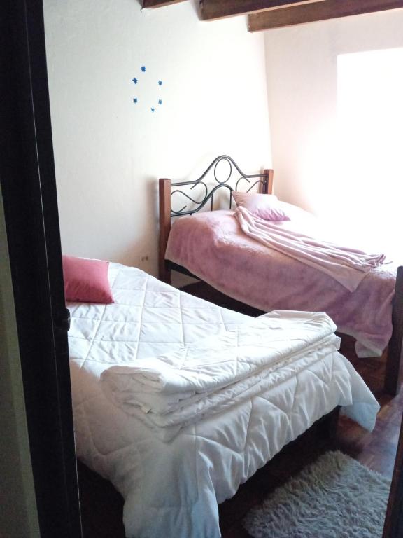 Postel nebo postele na pokoji v ubytování Casa Hermosa