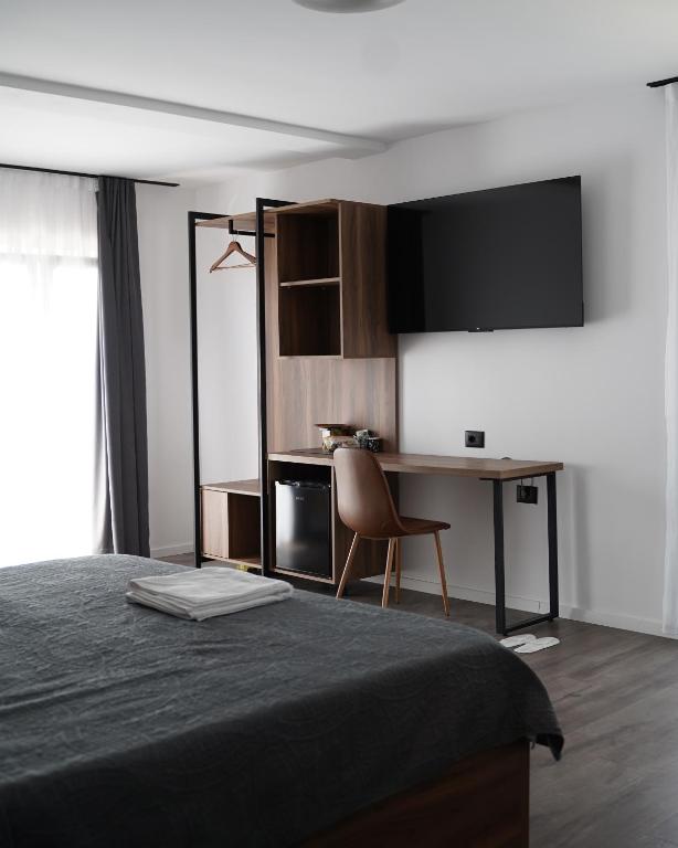 TV a/nebo společenská místnost v ubytování Fole Apart Hotel