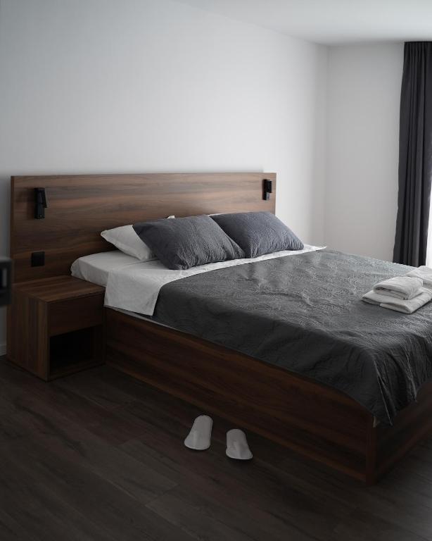 Postel nebo postele na pokoji v ubytování Fole Apart Hotel
