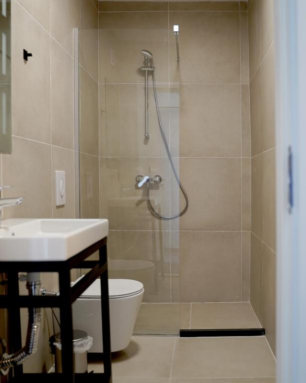 Koupelna v ubytování Fole Apart Hotel