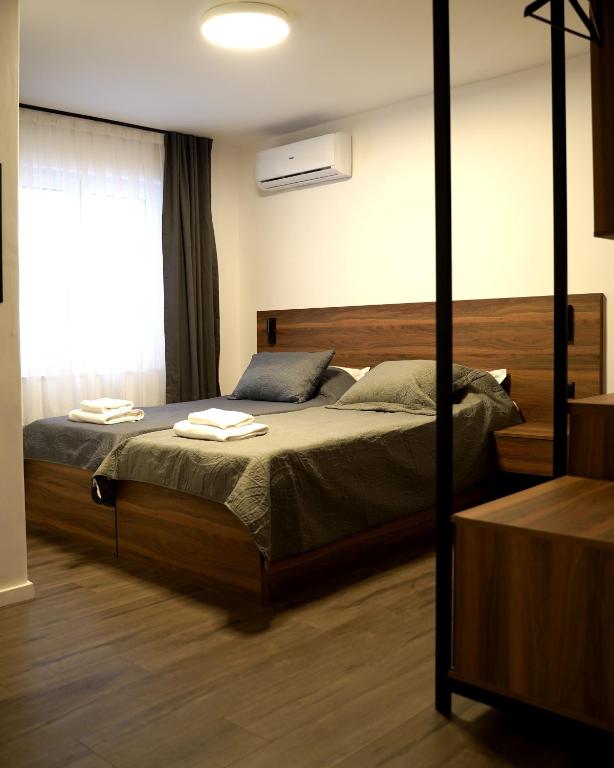 Postel nebo postele na pokoji v ubytování Fole Apart Hotel