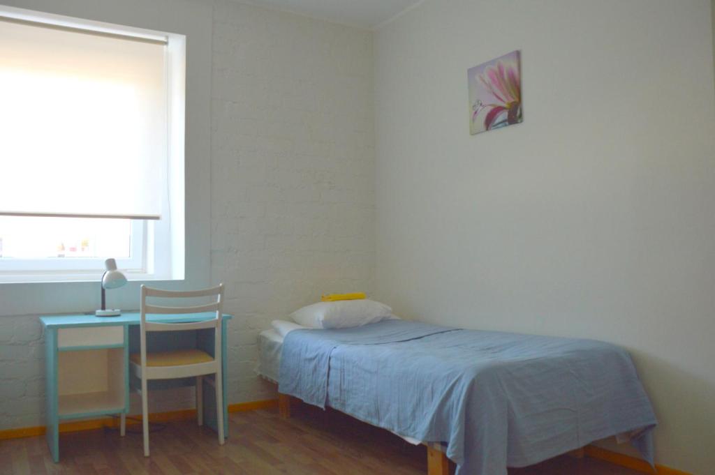 Letto o letti in una camera di Saare Automatic Hostel