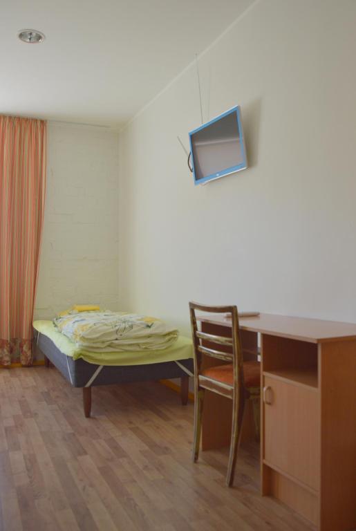 Letto o letti in una camera di Saare Automatic Hostel