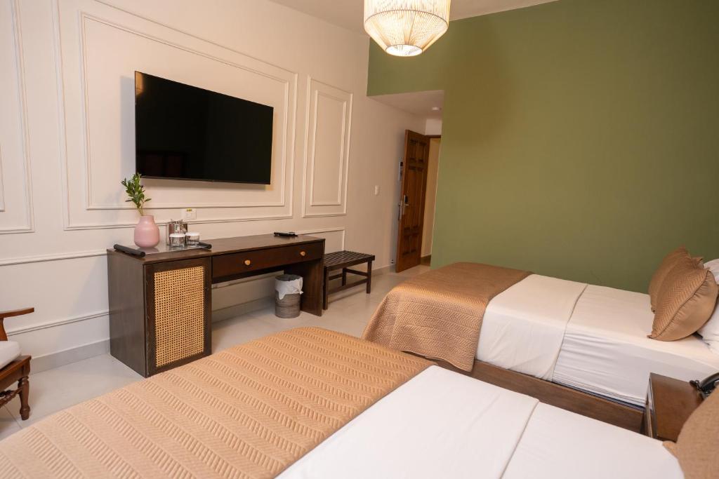 Postel nebo postele na pokoji v ubytování Hotel Pinar Dorado By Hotel Gran Jimenoa