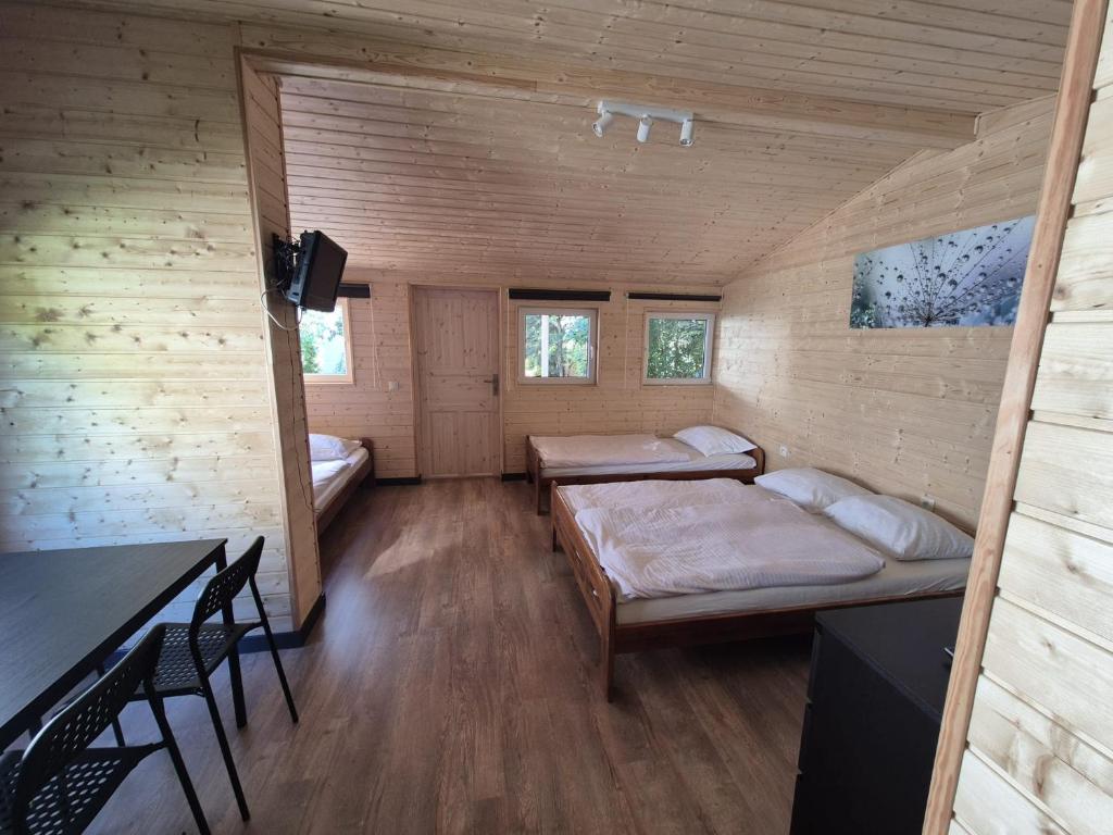 Posteľ alebo postele v izbe v ubytovaní Apartamenty Otylka