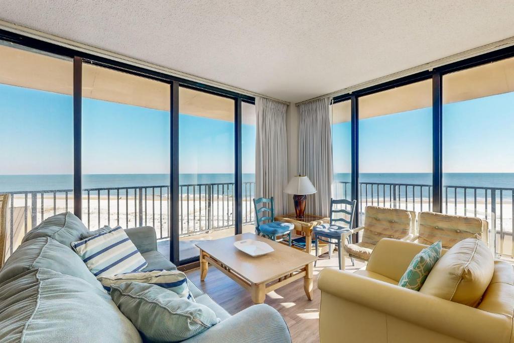 a living room with a view of the ocean at Sea Colony - 501 Brandywine House Rd in Bethany Beach