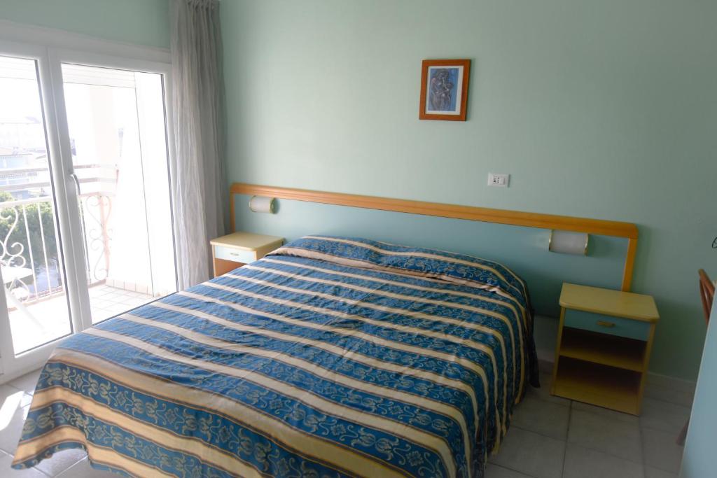 Postel nebo postele na pokoji v ubytování Hotel Bahamas