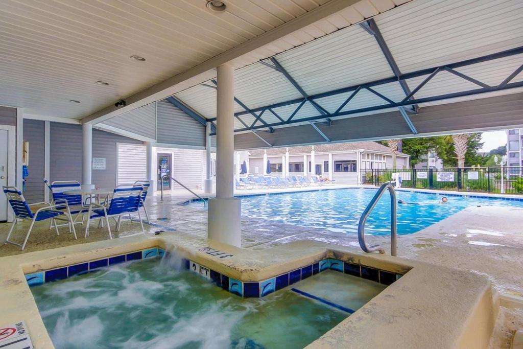 Der Swimmingpool an oder in der Nähe von Ocean&#39;s Bliss at Arcadian Dunes