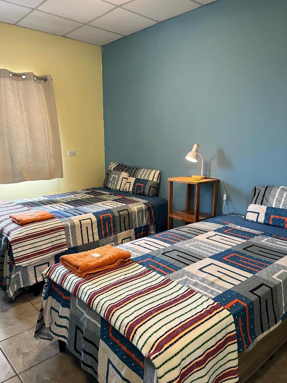 Hostal Cumbres del Volcan Flor Blanca - Dört Kişilik Oda - Özel Banyolu