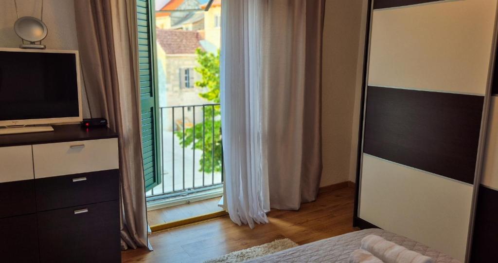 Posteľ alebo postele v izbe v ubytovaní Central Apartment Castle Cippico