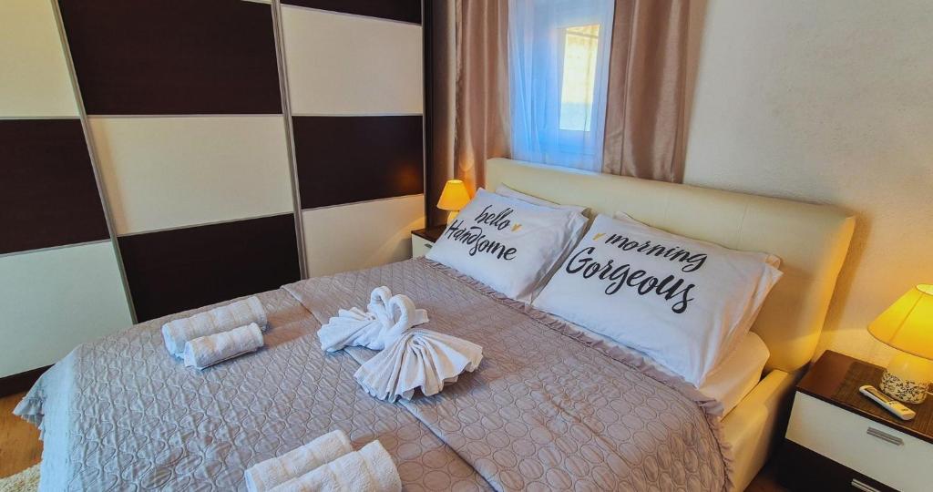 Posteľ alebo postele v izbe v ubytovaní Central Apartment Castle Cippico
