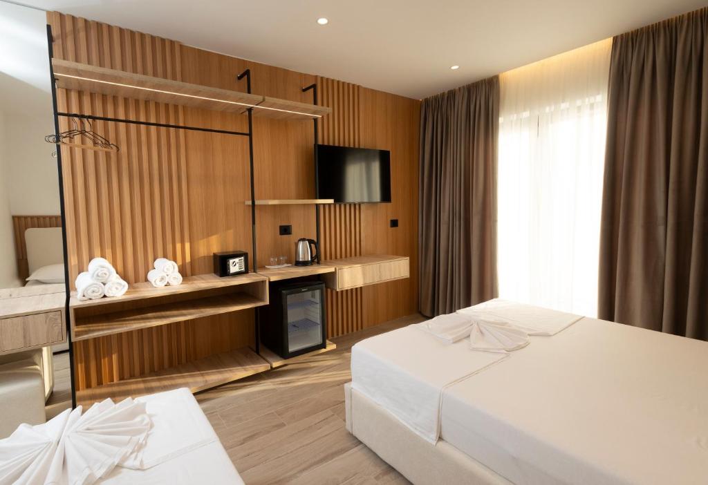 Postel nebo postele na pokoji v ubytování Albatros Beach & Resort