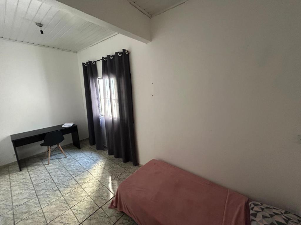 Postel nebo postele na pokoji v ubytování Quarto individual