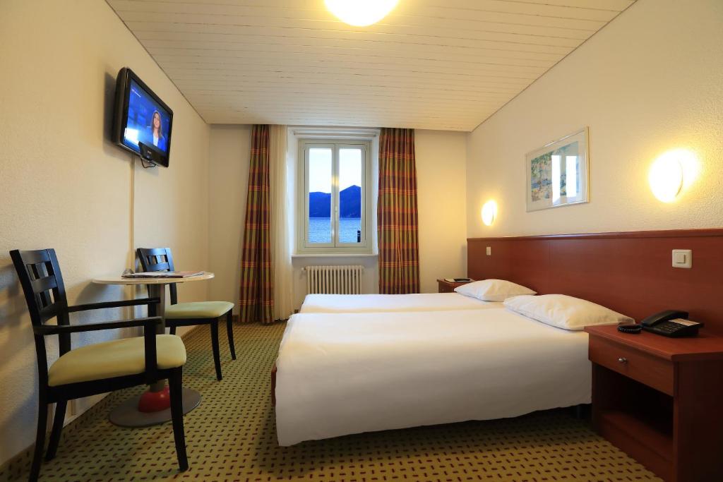 TV a/nebo společenská místnost v ubytování Piazza Ascona Hotel & Restaurants