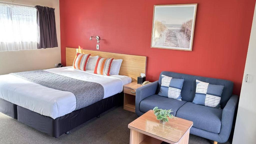 Postel nebo postele na pokoji v ubytování Arcadia Motel