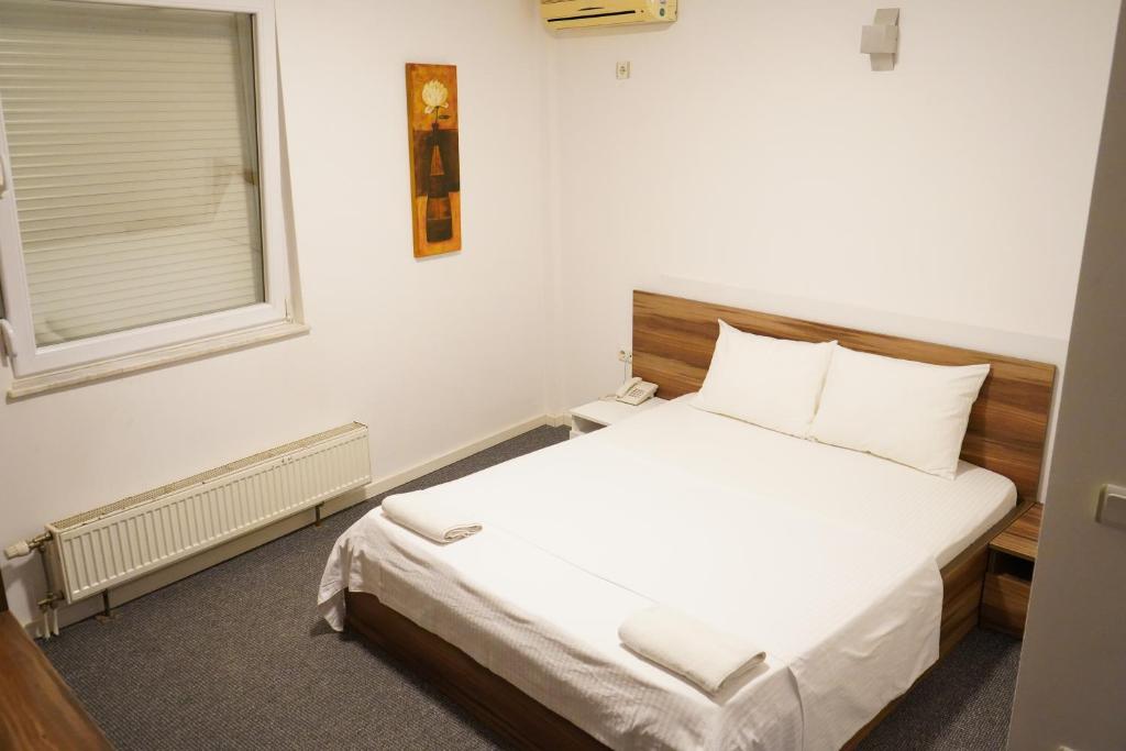 Postel nebo postele na pokoji v ubytování Apartament Koha