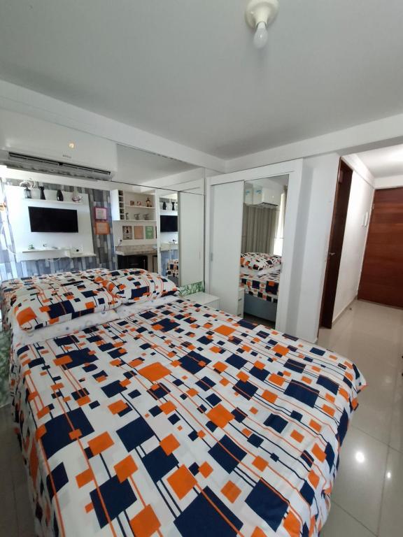 a bedroom with a large bed in a store at Flat vista mar de Intermares completíssimo 508 in João Pessoa