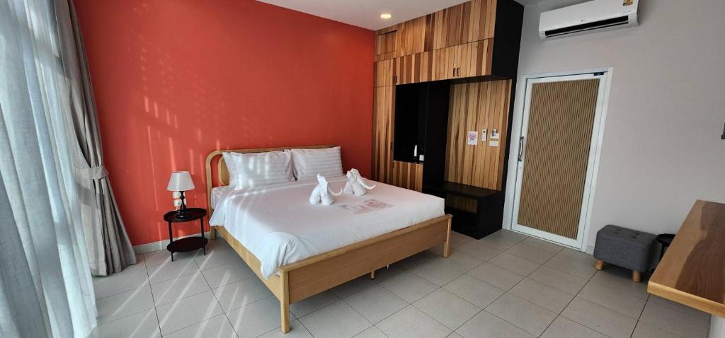 Postel nebo postele na pokoji v ubytování Lenny's Koh Samui
