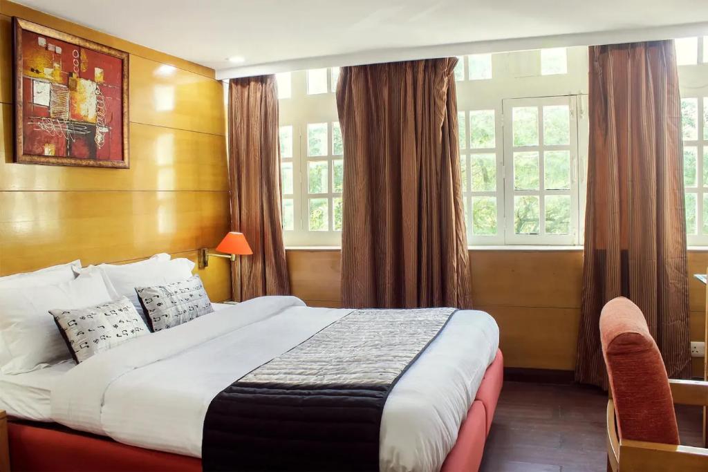 Postel nebo postele na pokoji v ubytování Hotels Daffodils
