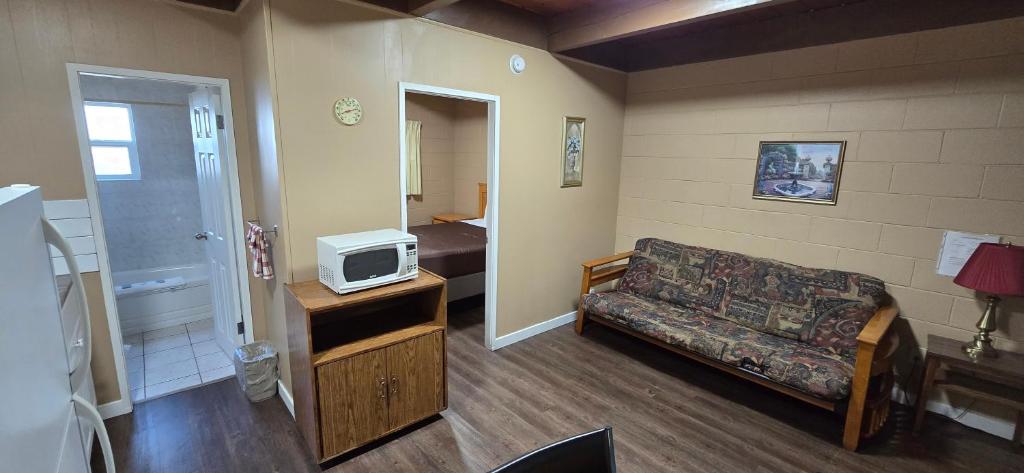 Kuchyň nebo kuchyňský kout v ubytování Flamingo Motel