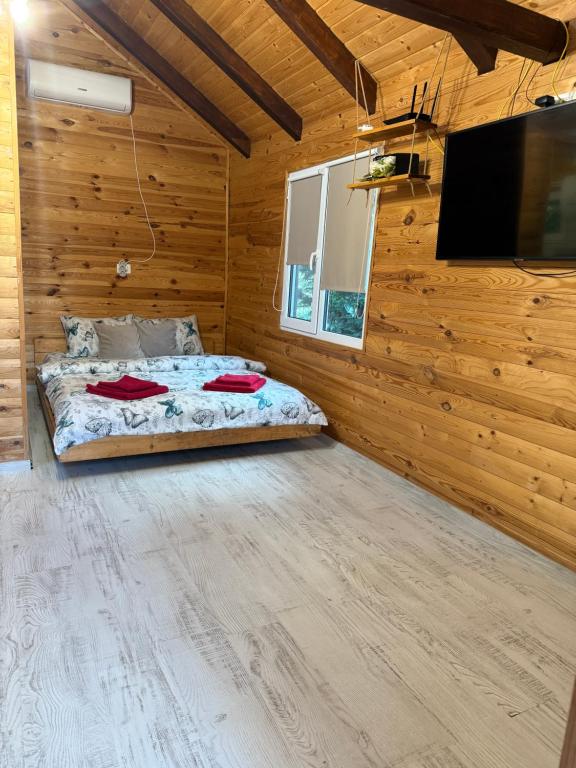 Postel nebo postele na pokoji v ubytování Cabana Sorina