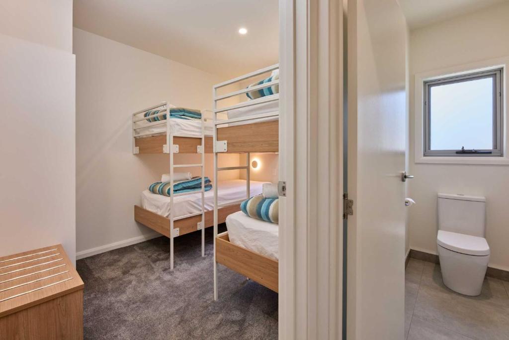 Postel nebo postele na pokoji v ubytování BIG4 Launceston Holiday Park