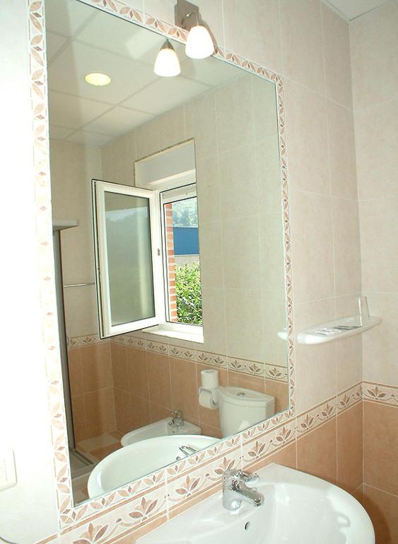 Koupelna v ubytování Hotel La Guindal