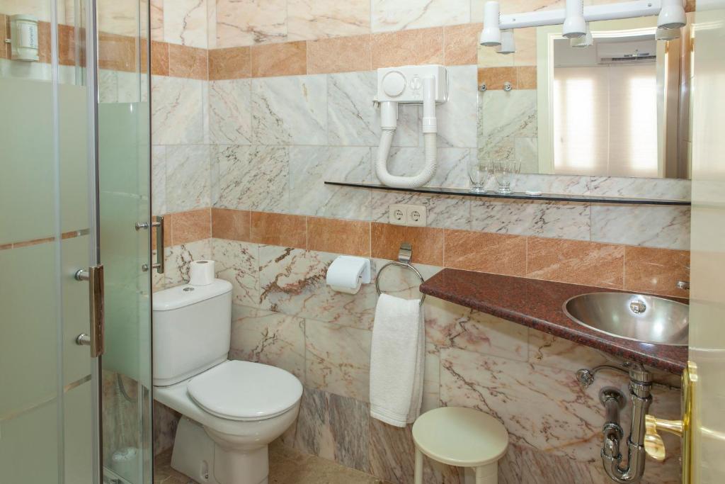 Koupelna v ubytování Hotel Agora