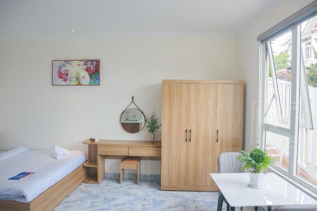 Postel nebo postele na pokoji v ubytování Hamia Boutique Hotel managed by Marcom Jack Lee