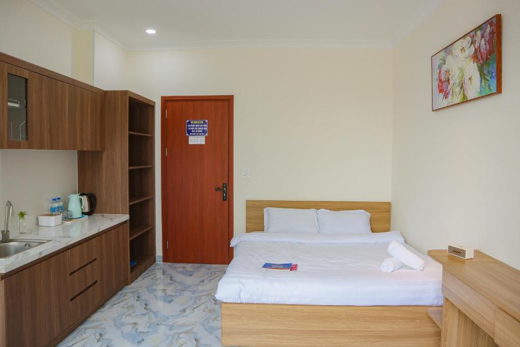 Postel nebo postele na pokoji v ubytování Hamia Boutique Hotel managed by Marcom Jack Lee