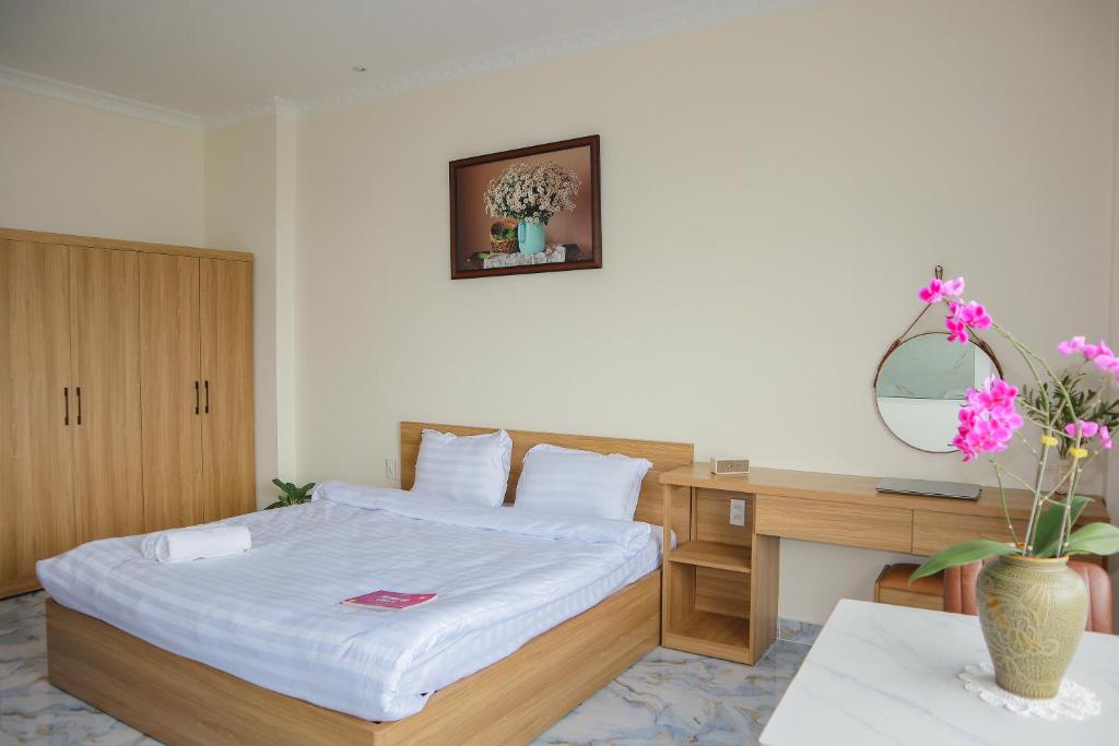 Postel nebo postele na pokoji v ubytování Hamia Boutique Hotel managed by Marcom Jack Lee