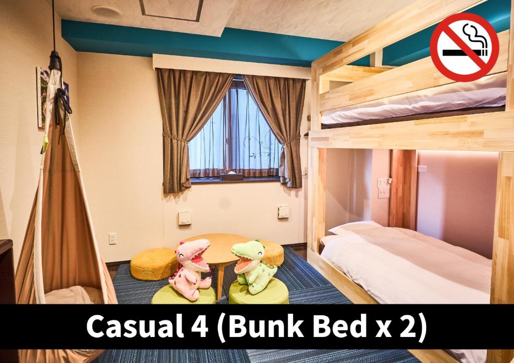 Postel nebo postele na pokoji v ubytování Hotel K6 Osaka Namba