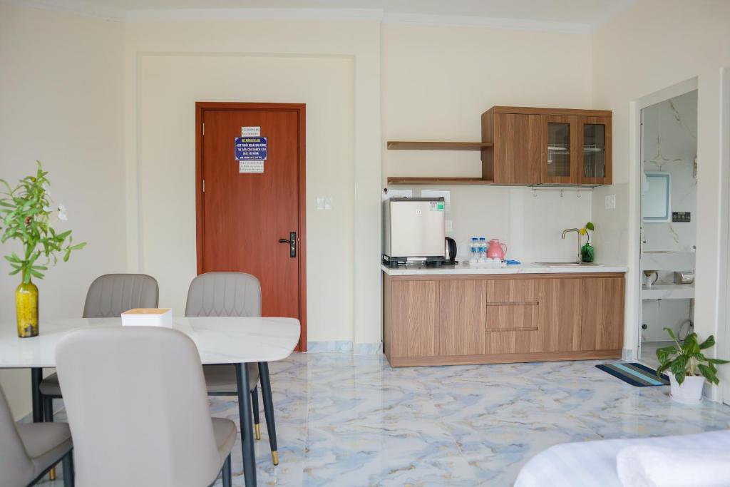 Kuchyň nebo kuchyňský kout v ubytování Hamia Boutique Hotel managed by Marcom Jack Lee
