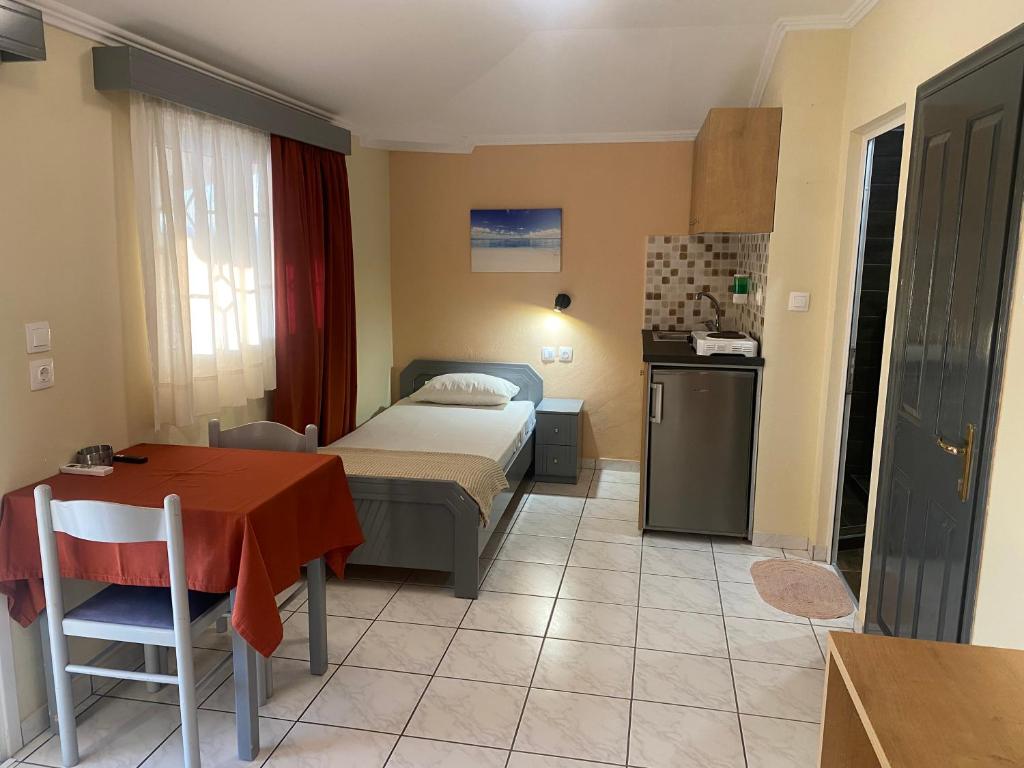 Postel nebo postele na pokoji v ubytování Oasis